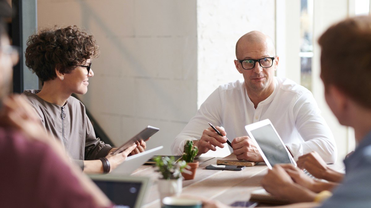 Boss open to ideas during staff meeting