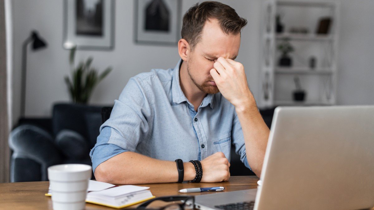 Overworked man quiet quitting