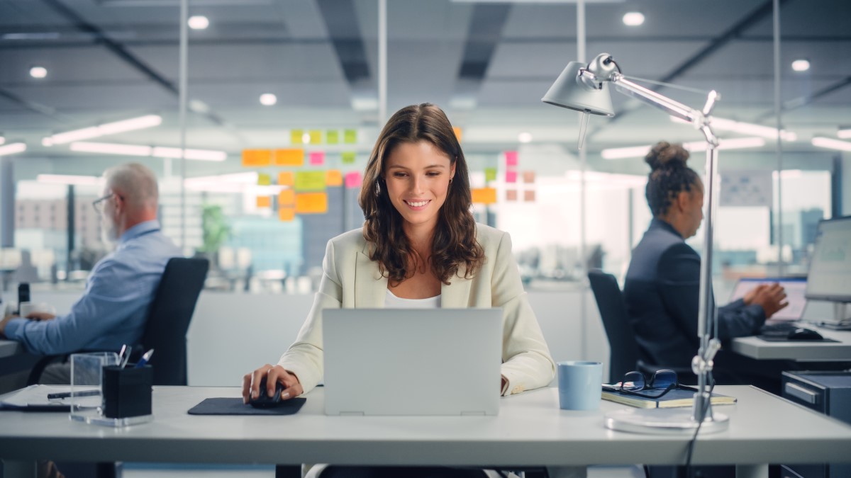 Happy employee in the workplace