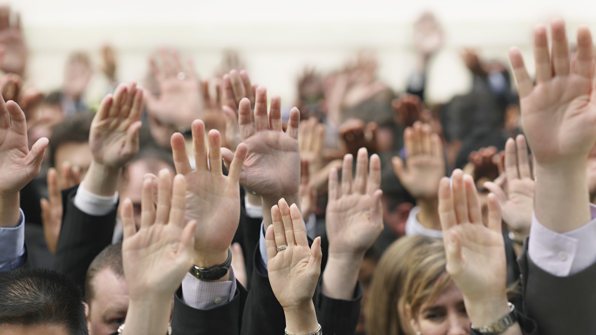 An audience asking to participate in a survey