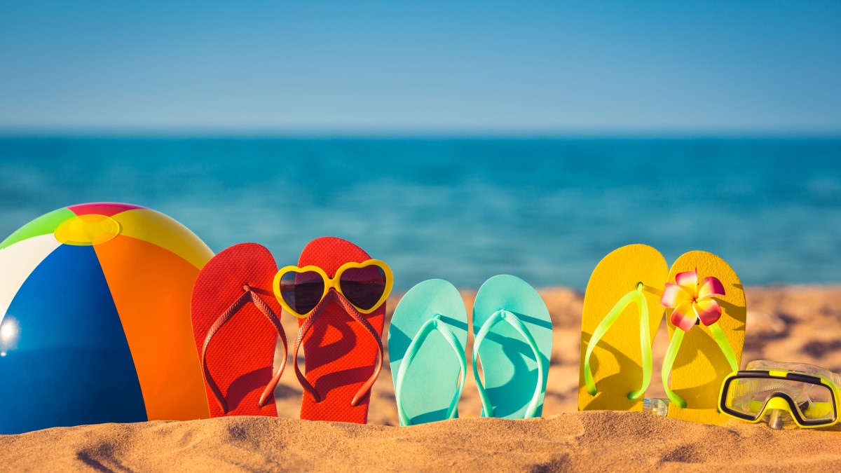 Beach scene showing that the Summer hospitality season is here